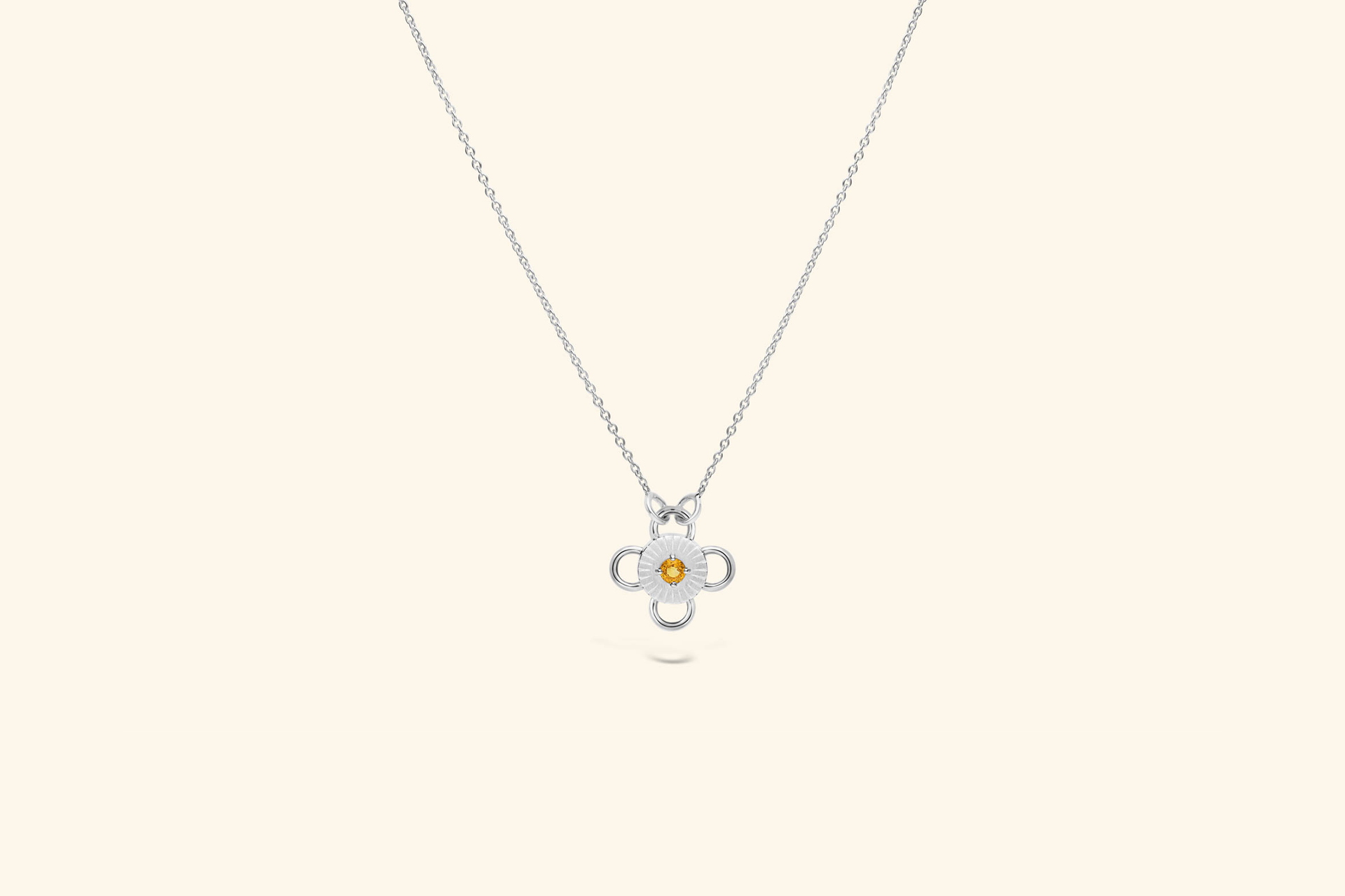 Collier Baby Bolt, saphir jaune de ~0,2 carat serti sur un motif en argent.