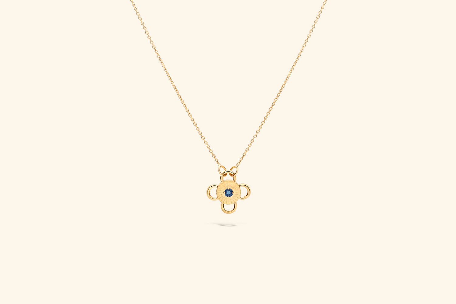 Collier Baby Bolt, saphir de ~0,04 carat serti sur un motif en or jaune 18k recyclé.