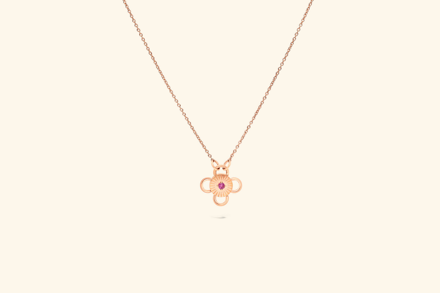 Collier Baby Bolt, saphir rose de ~0,07 carat serti sur un motif en or rose recyclé.
