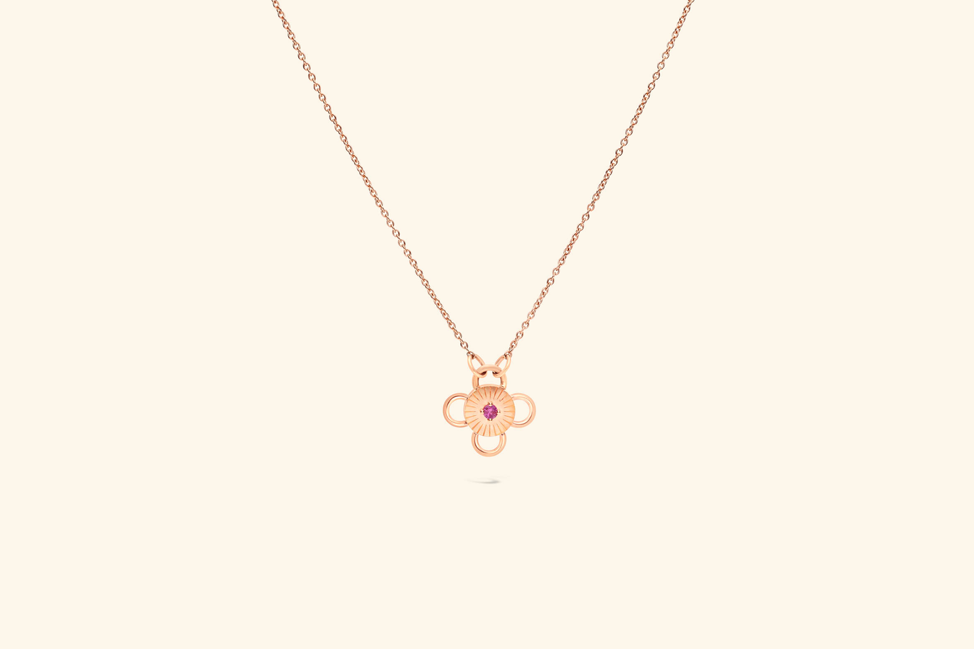 Collier Baby Bolt, saphir rose de ~0,07 carat serti sur un motif en or rose recyclé.